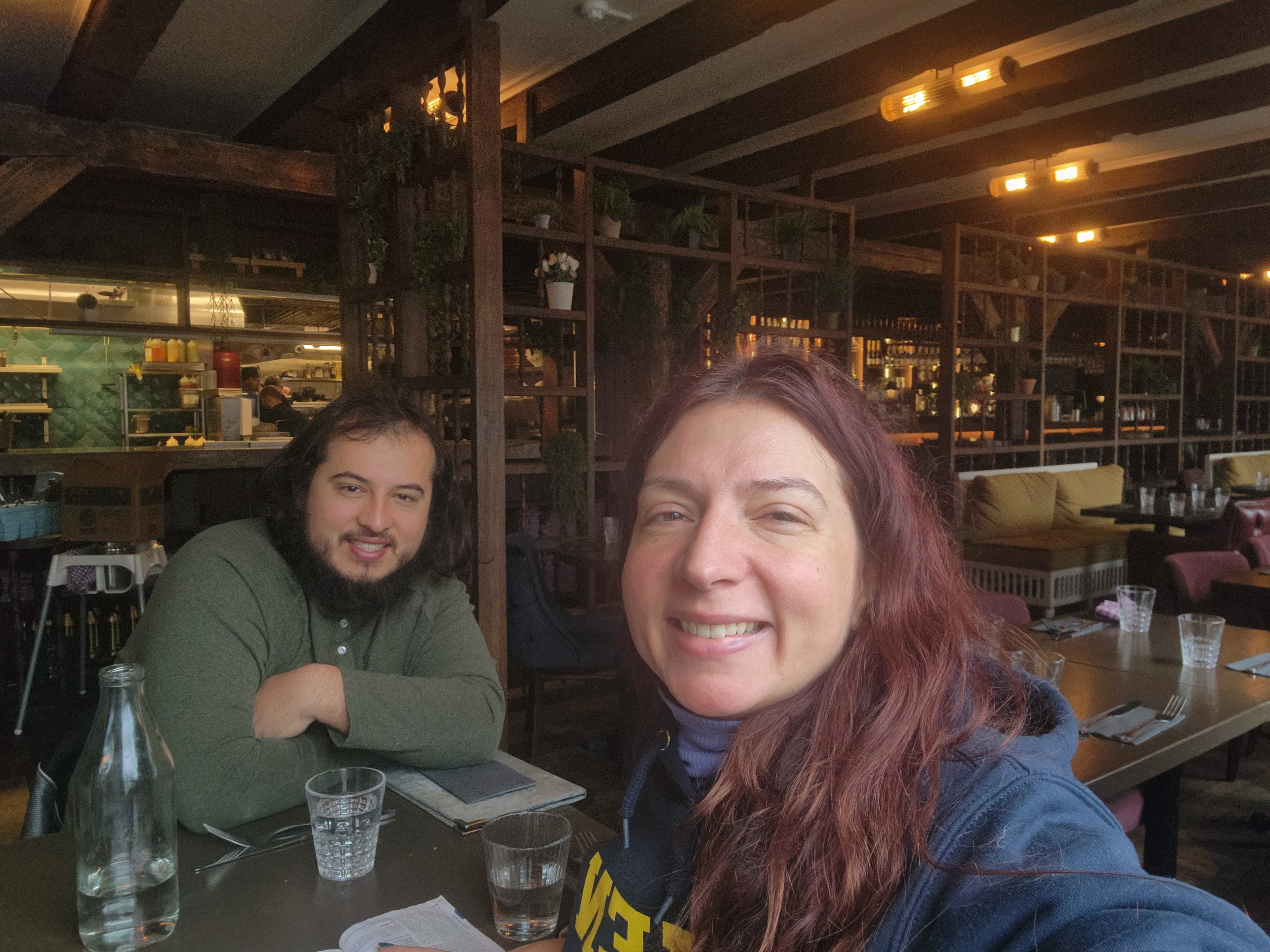 Alex and Jessica sharing dinner at a Harry Potter-themed restaurant