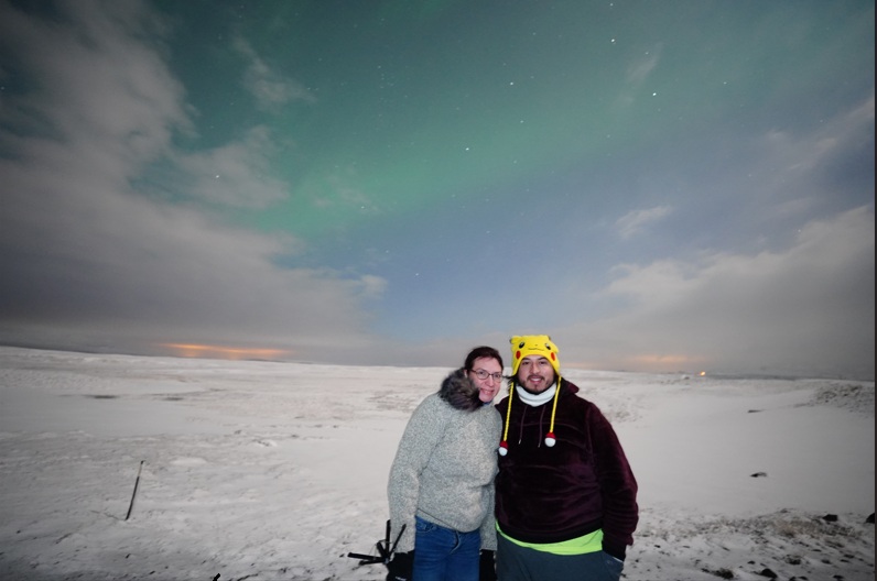 Alex and Jessica under the northern lights in Iceland